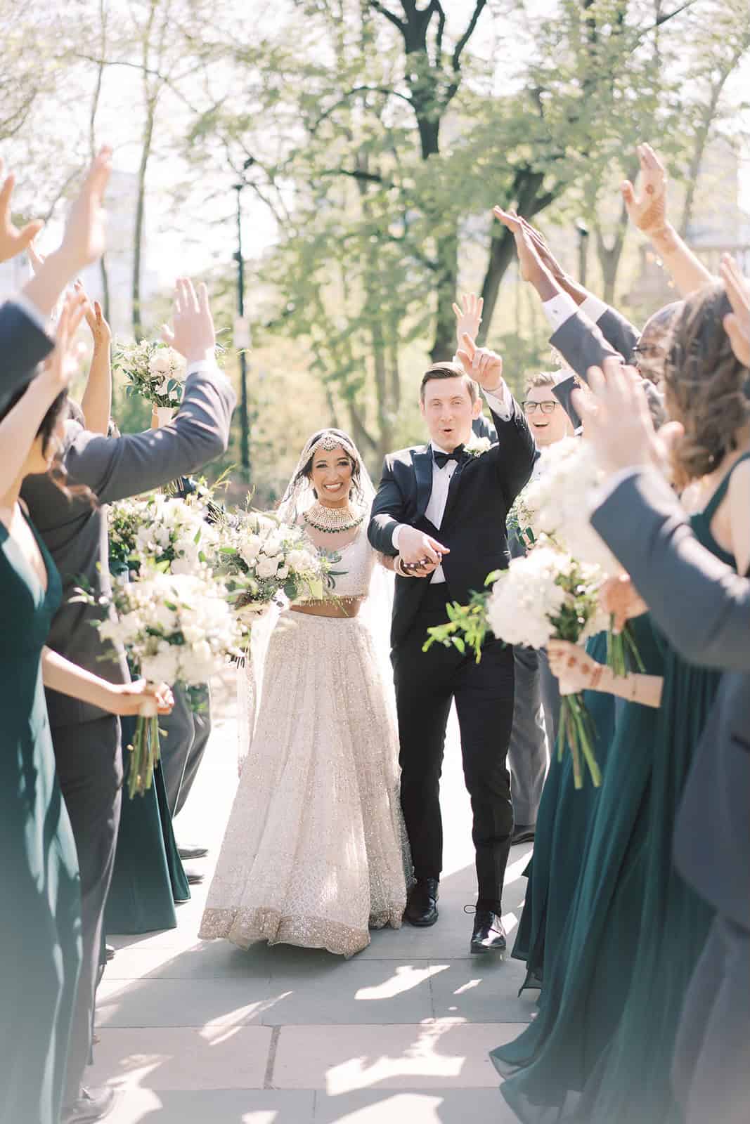 Bride and groom with their wedding party at their destination wedding in Philadelphia
