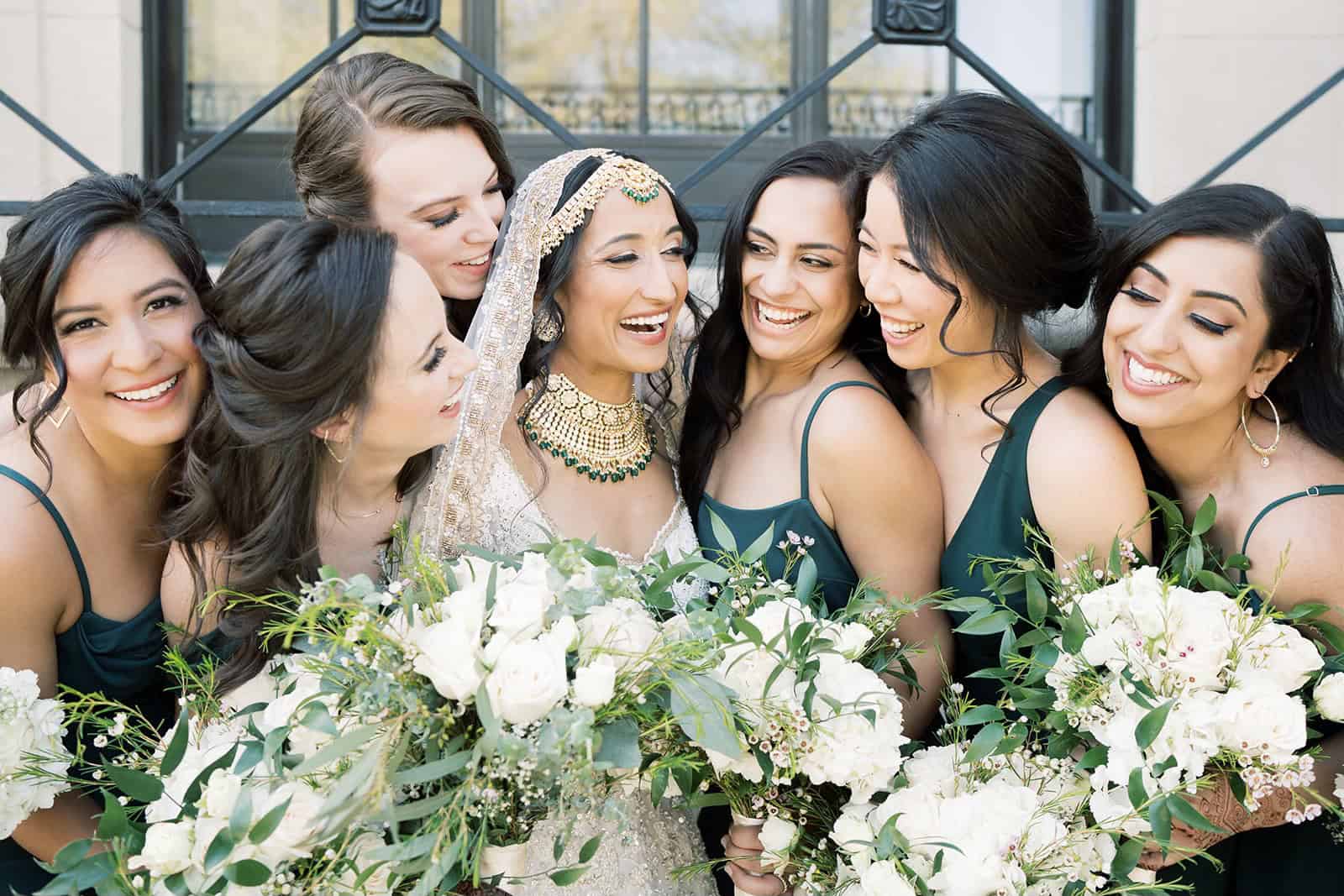 Bride with bridesmaids at the South Asian wedding